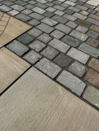 Kandla Grey tumbled cobbles 200x100 in display area at Melton Stone - Preview