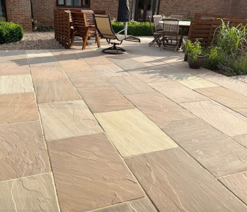 House extension using Raj Green 600x900 riven Indian sandstone patio slabs - Preview